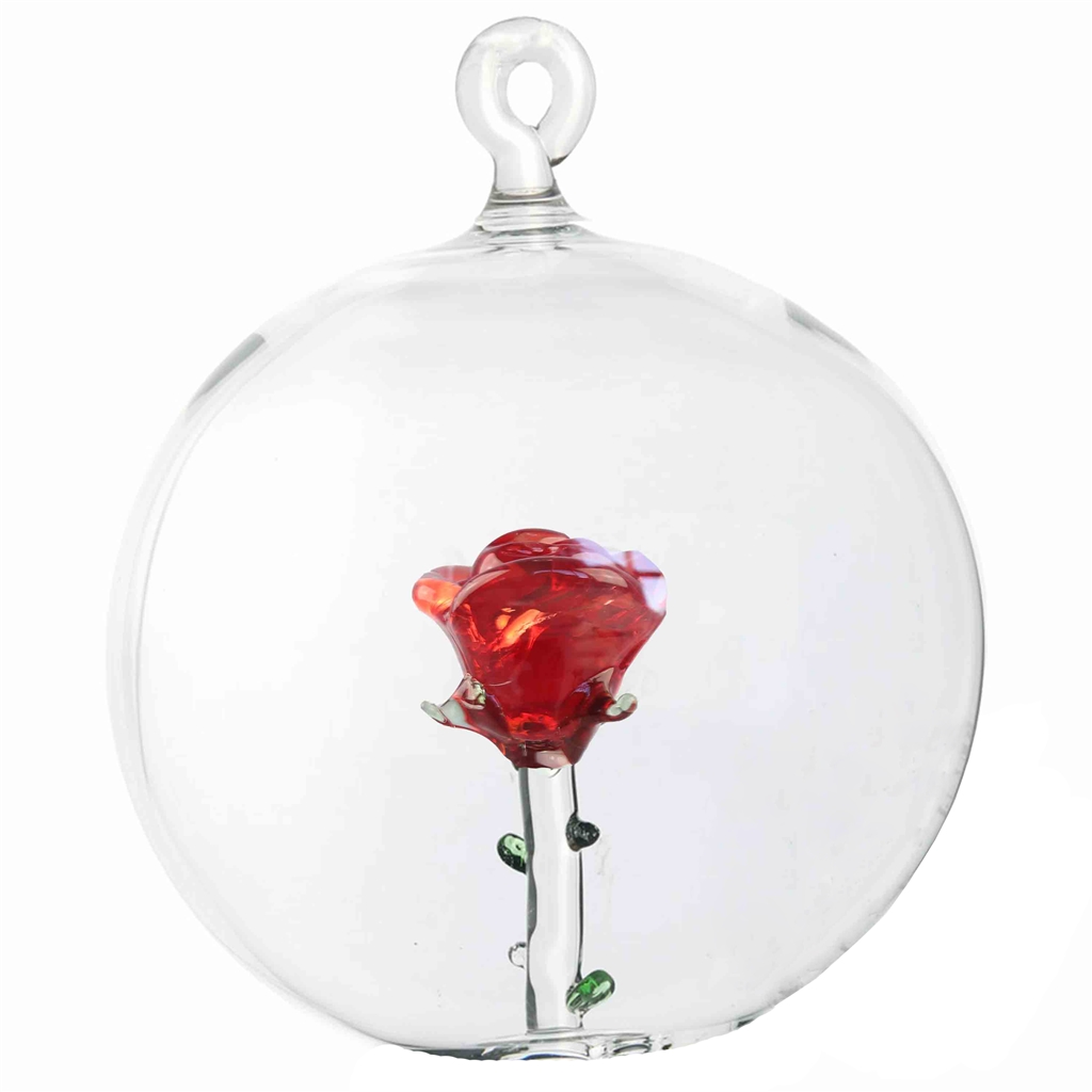 Boule en verre rose avec des épines